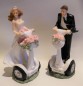 Preview: Tortenfigur Tortenaufsatz zur Hochzeit Brautpaar auf Segway 16 cm TA0125
